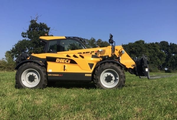 A yellow DIECI AGRI FARMER 30.7 TELEHANDLER tractor parked in a field.